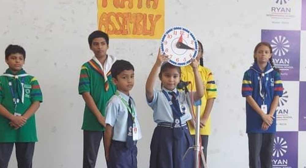 The school has a Math Centre of Excellence. As part of the MCE programme, a math assembly is conducted on a monthly basis. The math assembly conducted on July 24, 2023, focused on the concept of time. The students during the school assembly shared the importance of time and the use of clock hands to read the time.